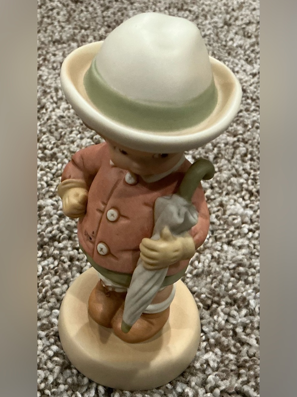 Enesco Cream, Green and Pink Boy Figurine with Umbrella